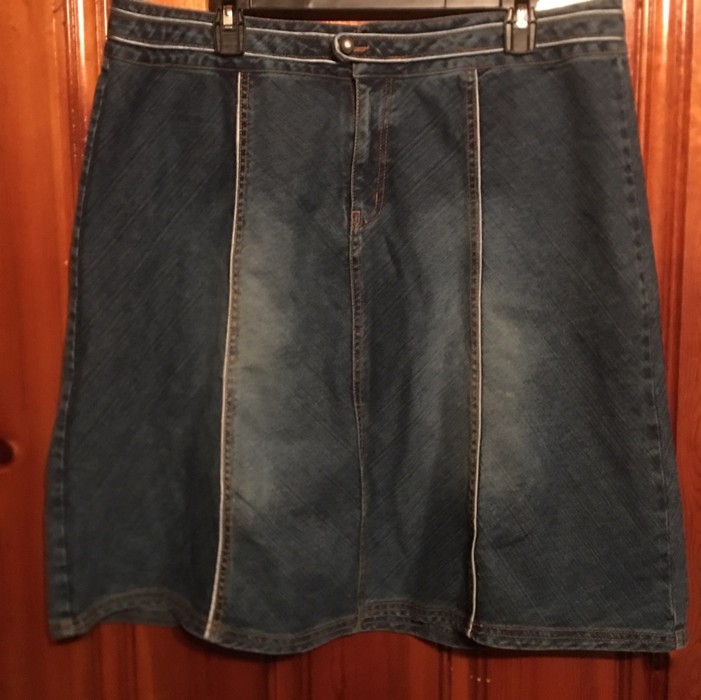 Knee-length jean skirt with matching jacket.